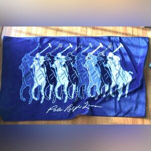 Polo Ralph Lauren jacquard beach towel featuring an all-over blue polo